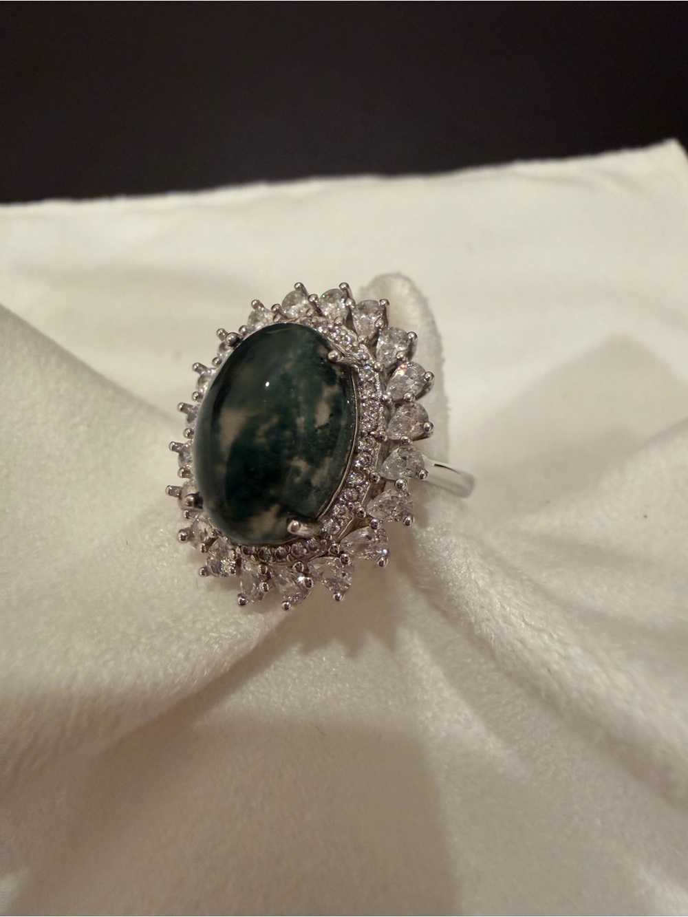 Sterling Silver Adjustable Ring with Green Oval Stone and Halo Accents
